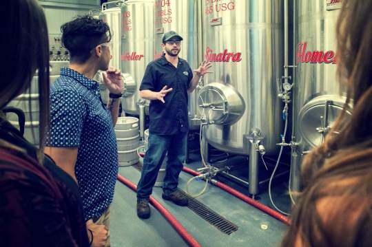 Tours guests and AIB serving tanks